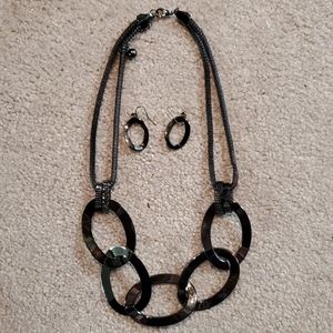 Black, metallic statement necklace with matching e